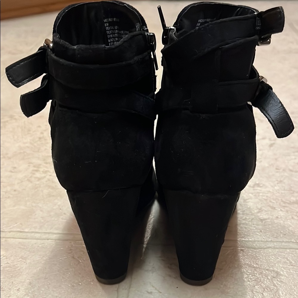 Black Heeled Boots with Wedge Heel and Decorative Strap - Picture 2 of 4